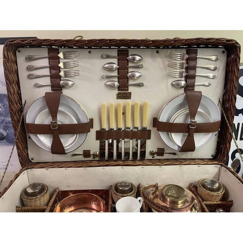 321 - A good Scott & Sons 1920s wicker cased picnic set, complete with a set of six Bisto white bone c... 