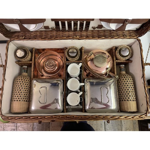 321 - A good Scott & Sons 1920s wicker cased picnic set, complete with a set of six Bisto white bone c... 