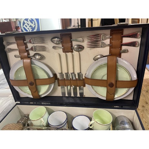 382 - A four piece picnic set, the Finnigans rexine covered case opening to reveal a fitted interior with ... 