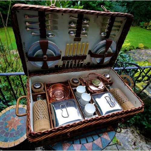 321 - A good Scott & Sons 1920s wicker cased picnic set, complete with a set of six Bisto white bone c... 