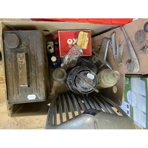 430 - Various car bonnet emblems, badges, a Riley radiator surround grill, a lamp, fuel can, bottles and o... 