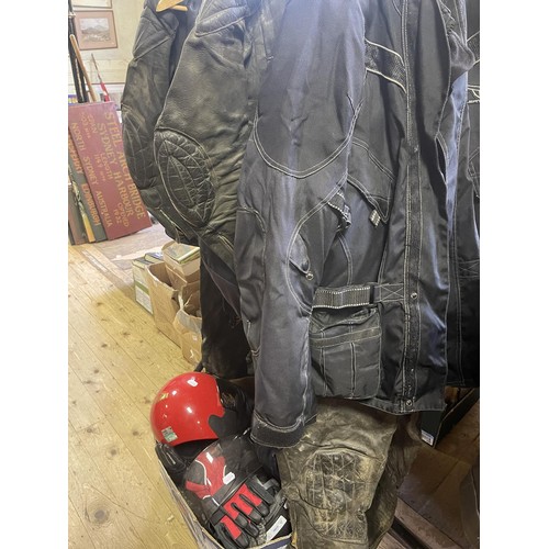 431 - A quantity of motorcycle clothing and other items