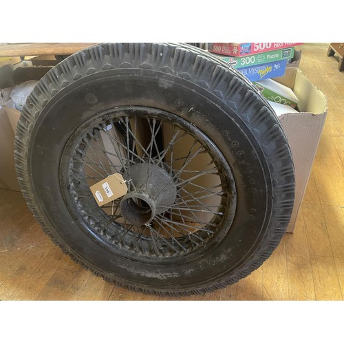 239 - A pair of 18 inch wire wheels, 52 mm hub, side laced 4 and 5 inch rim, 2 1/4 inch offset, with Goody... 