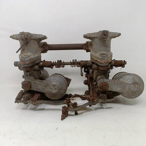 255 - A pair of 1 1/4 inch SU carburettors, 6 7/8 inch between centres, on a manifold