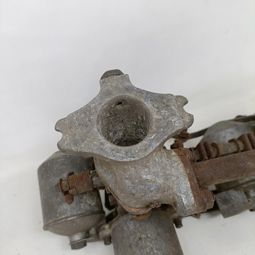 255 - A pair of 1 1/4 inch SU carburettors, 6 7/8 inch between centres, on a manifold