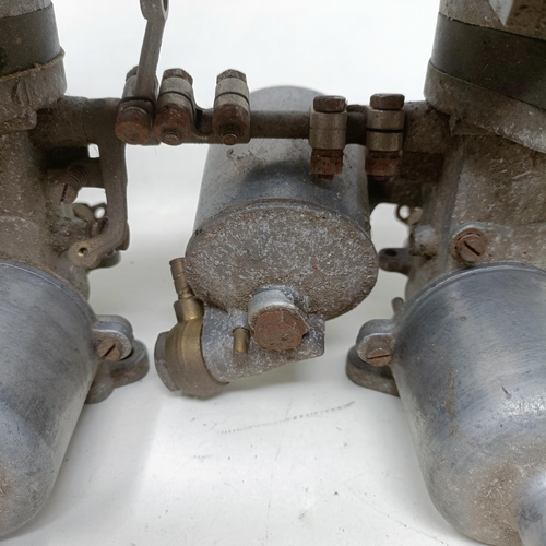 256 - A pair of 1 1/4 inch SU carburettors, 6 inches between centres, on a manifold