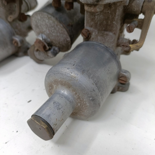 256 - A pair of 1 1/4 inch SU carburettors, 6 inches between centres, on a manifold