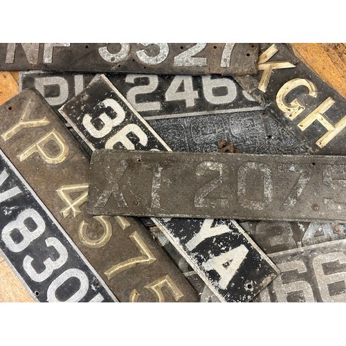 260 - A group of 23 pre-war alloy registration number plates