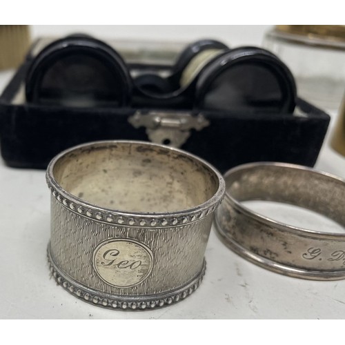 1859 - A 9ct gold locket, a silver plated napkin ring, a pair of opera glasses and other items