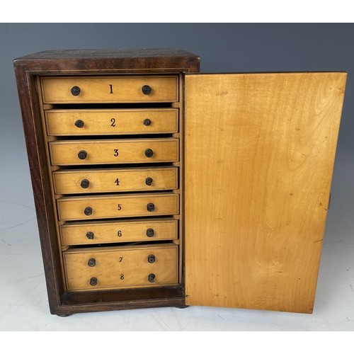 1863 - A 19th century Italian table top collectors cabinet, inlaid with figures, the hinged door to reveal ... 