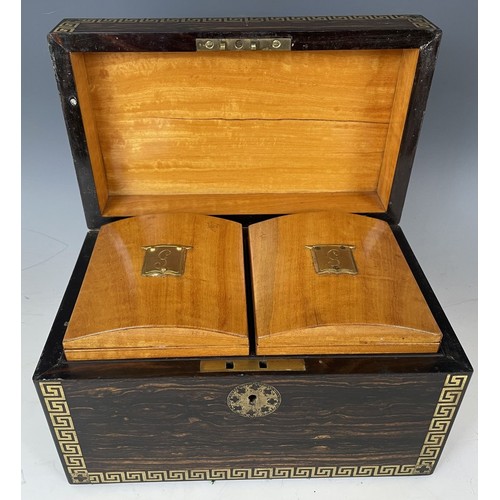 1864 - A 19th century coromandel and brass inlaid tea caddy, fitted two satinwood caddies, 26 cm wide