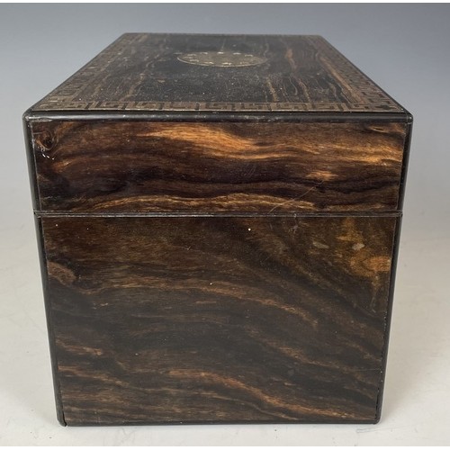 1864 - A 19th century coromandel and brass inlaid tea caddy, fitted two satinwood caddies, 26 cm wide