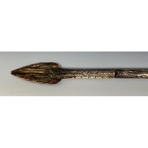 1805 - A carved bone blow pipe, in the form of a dragon, probably from Borneo, 82 cm