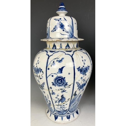 1806 - A pair of Delft blue and white vases and covers, 45 cm high