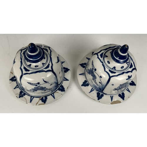 1806 - A pair of Delft blue and white vases and covers, 45 cm high