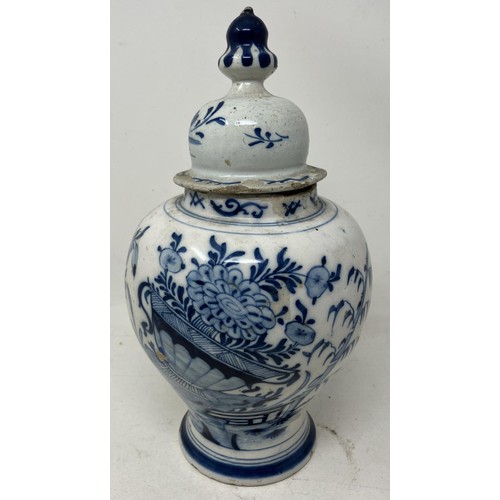 1814 - A blue and white Delft vase and cover, 30 cm high, and another with a Chinese style wooden mount (2)