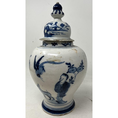 1814 - A blue and white Delft vase and cover, 30 cm high, and another with a Chinese style wooden mount (2)