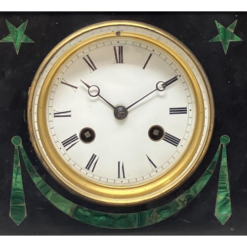 1828 - A mantel clock, in a polished slate case, 35 cm wide, and three others (4)