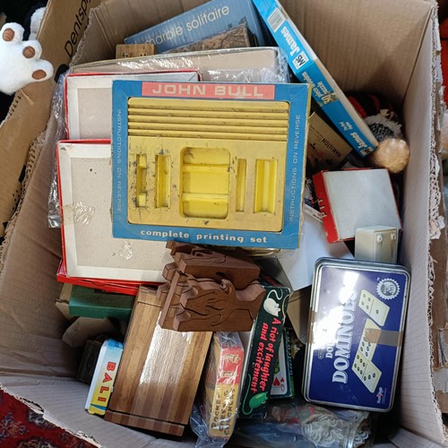 1891 - A large collection of assorted toys, dolls and board games (8 large boxes)