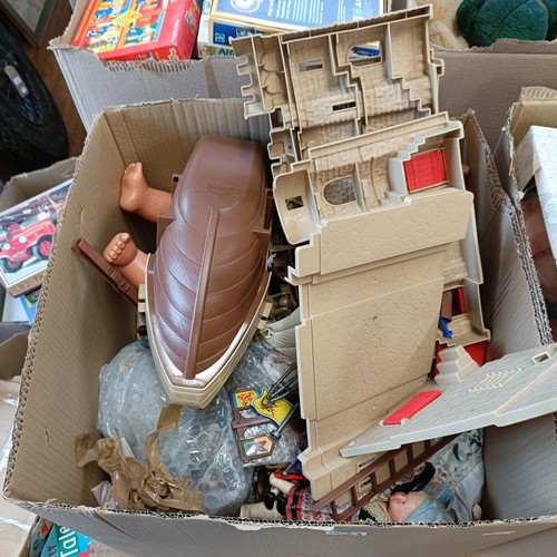 1896 - A large collection of assorted toys, dolls and board games (9 large boxes)