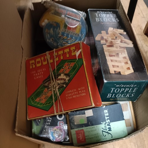 1898 - A large collection of assorted toys, dolls and board games (7 large boxes)