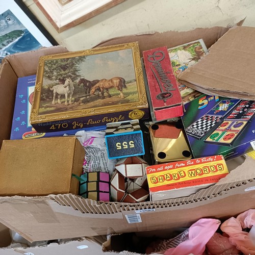 1900 - A large collection of assorted toys, dolls and board games (7 large boxes)