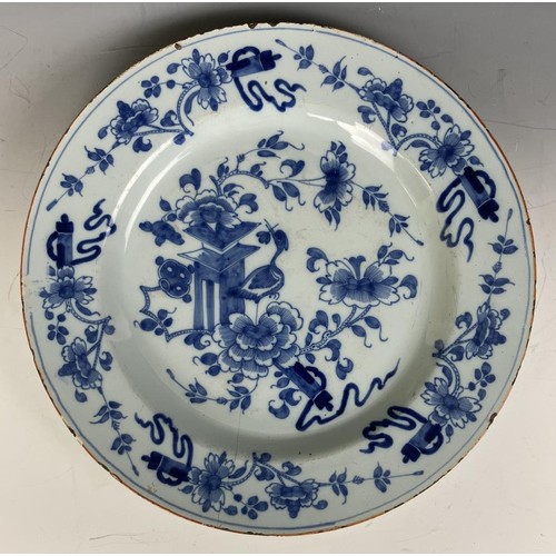 1852 - Three blue and white Delft plates (3)