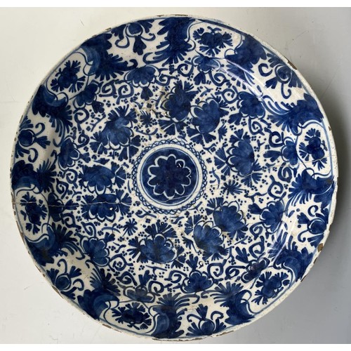 1852 - Three blue and white Delft plates (3)