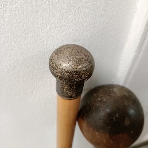 1917 - A silver mounted walking stick, and another (2)