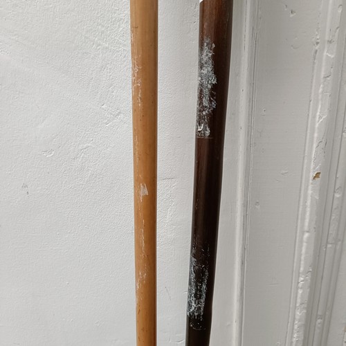 1917 - A silver mounted walking stick, and another (2)