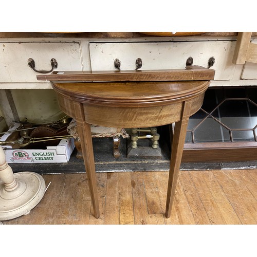 1998 - An oak corner cupboard, 72 cm wide, a metal trunk, a demi-lune card table, leg off, a red ground rug... 