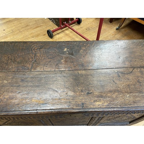 1976 - An oak coffer, 130 cm wide