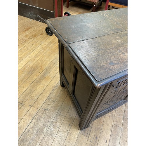 1976 - An oak coffer, 130 cm wide