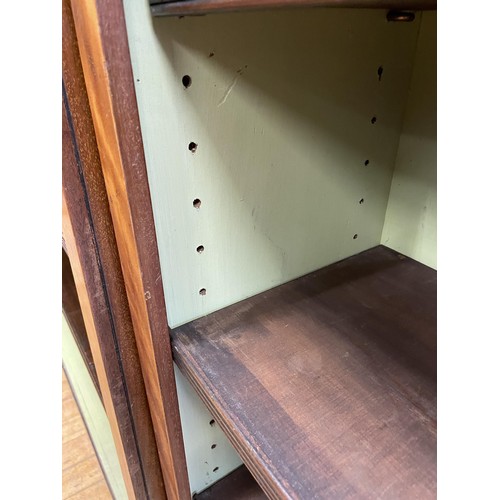 1994 - A pair of mahogany bookcases, with adjustable shelves, 123 cm high x 114 cm wide