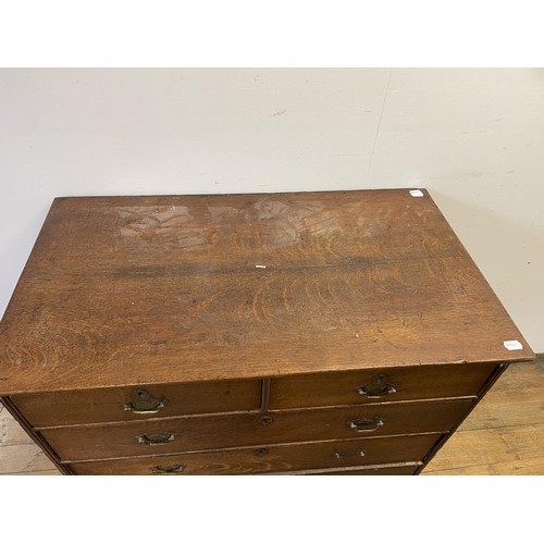 1964 - An oak chest, having two short and three long drawers, 96 cm wide