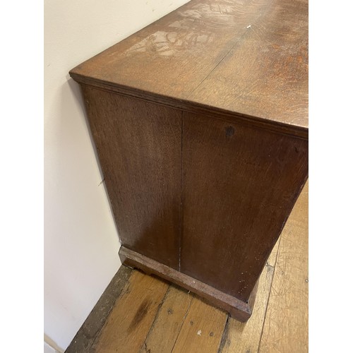 1964 - An oak chest, having two short and three long drawers, 96 cm wide