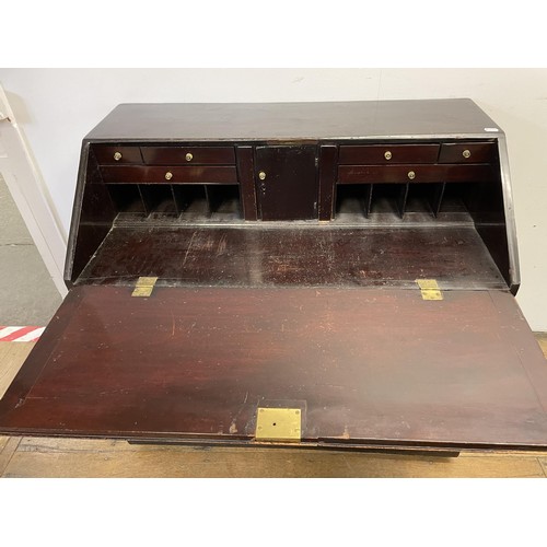 1944 - A mahogany bureau, 107 cm wide