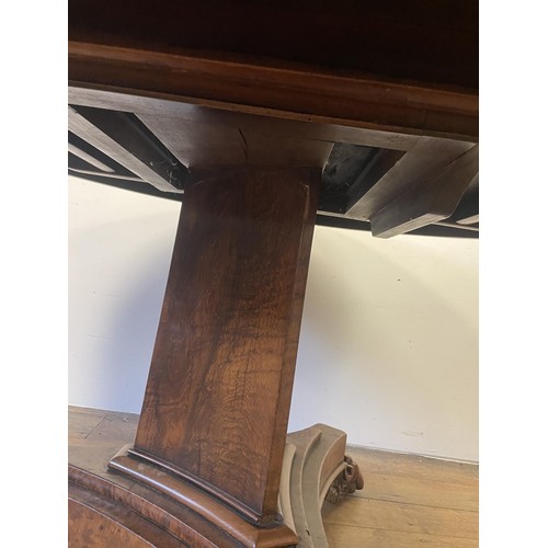 1938 - An early 19th century burr yew centre table, in the manner of George Bullock, the top with ebony str... 