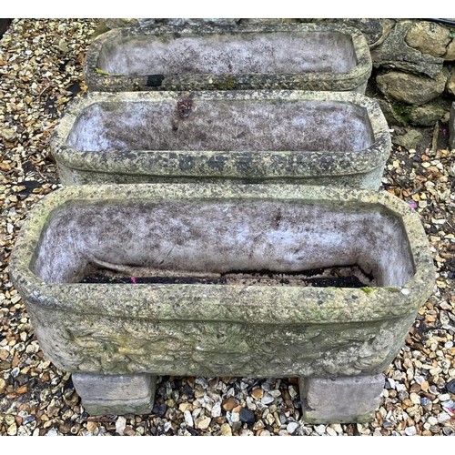 2017 - A set of three composite stone garden planters, 75 cm wide