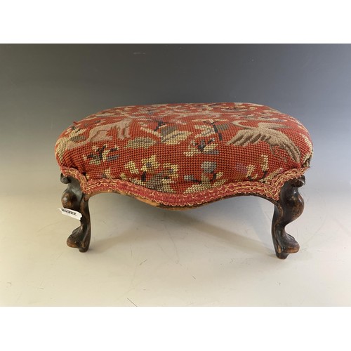 1943 - A mahogany marquetry inlay tray, 81 cm, and a footstool (2)