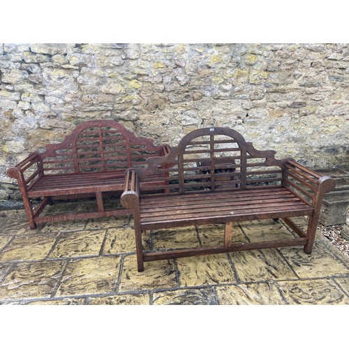 2027 - A pair of Lutyens style teak garden benches, 170 cm wide