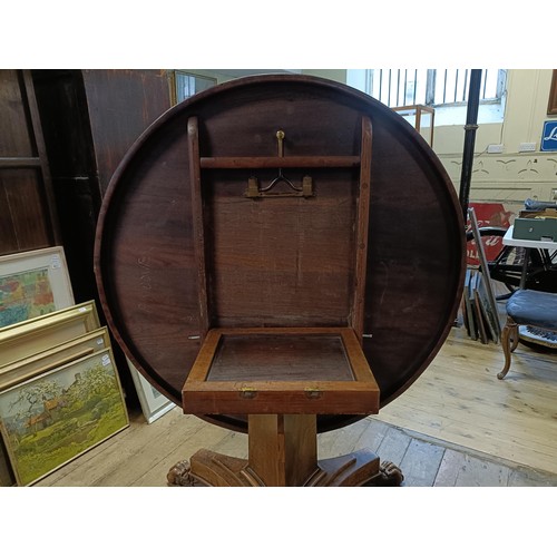 1938 - An early 19th century burr yew centre table, in the manner of George Bullock, the top with ebony str... 