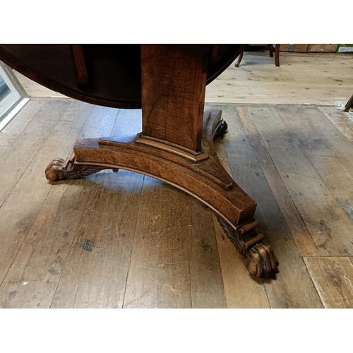 1938 - An early 19th century burr yew centre table, in the manner of George Bullock, the top with ebony str... 