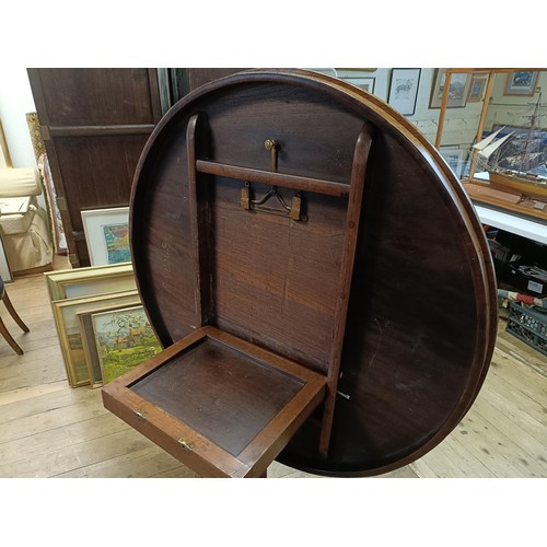 1938 - An early 19th century burr yew centre table, in the manner of George Bullock, the top with ebony str... 