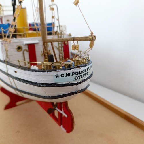 305 - A model of R.C.M. Police St Roch, 45 cm long and another ship (2)