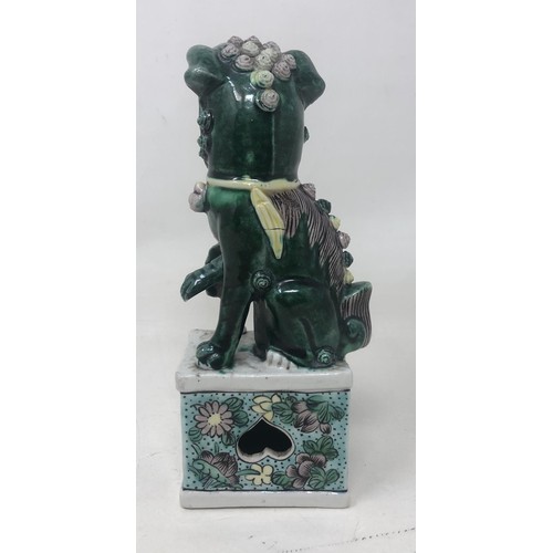 1046 - A Chinese famille verte Dog of Fo, 15 cm high