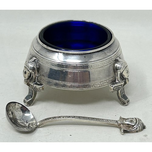 13 - A Victorian Egyptian revival silver salt, Birmingham 1878, and a matching spoon (2)