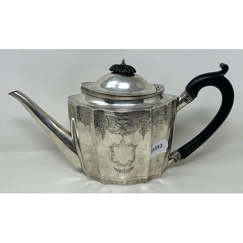 24 - A George III silver teapot, with an ebonised handle, London 1795, all in 14.63 ozt