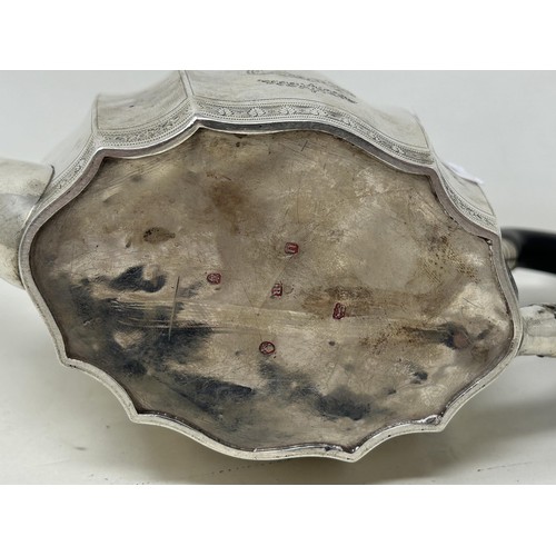 24 - A George III silver teapot, with an ebonised handle, London 1795, all in 14.63 ozt