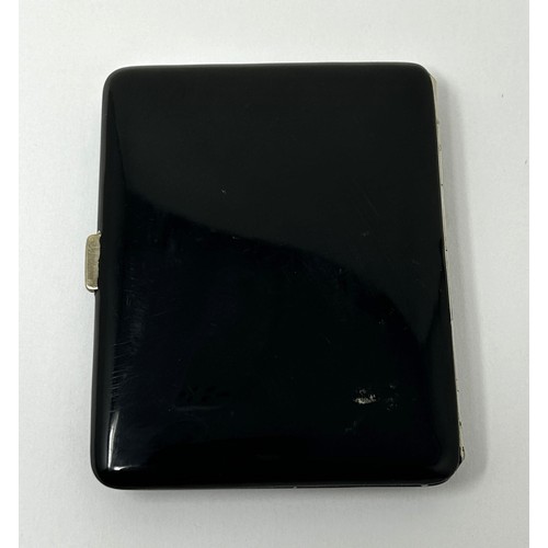 30 - An Art Deco black enamel cigarette case